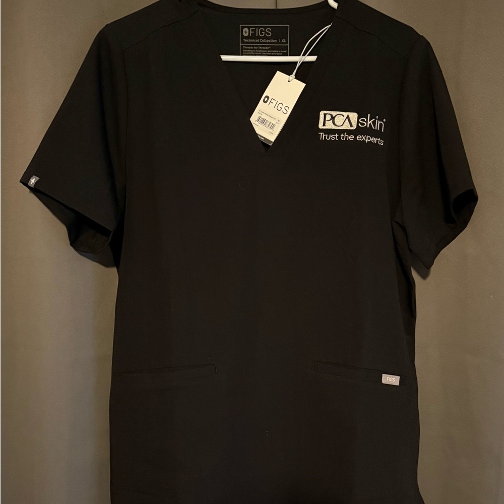 FIGS Casma 3-pocket Scrub Top PCA Skin embroidery.